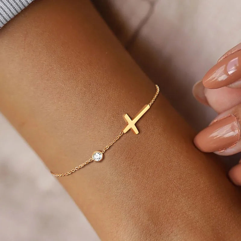 Colar ou pulseira dourado com cruz deitada
