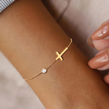 Colar ou pulseira dourado com cruz deitada