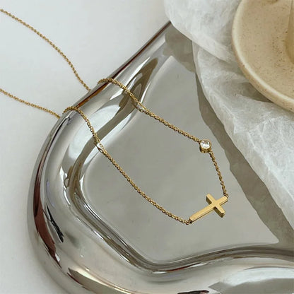 Colar ou pulseira dourado com cruz deitada